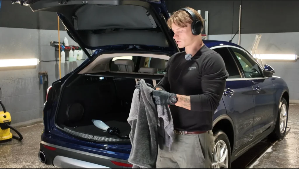 Detailer washing car with product usage